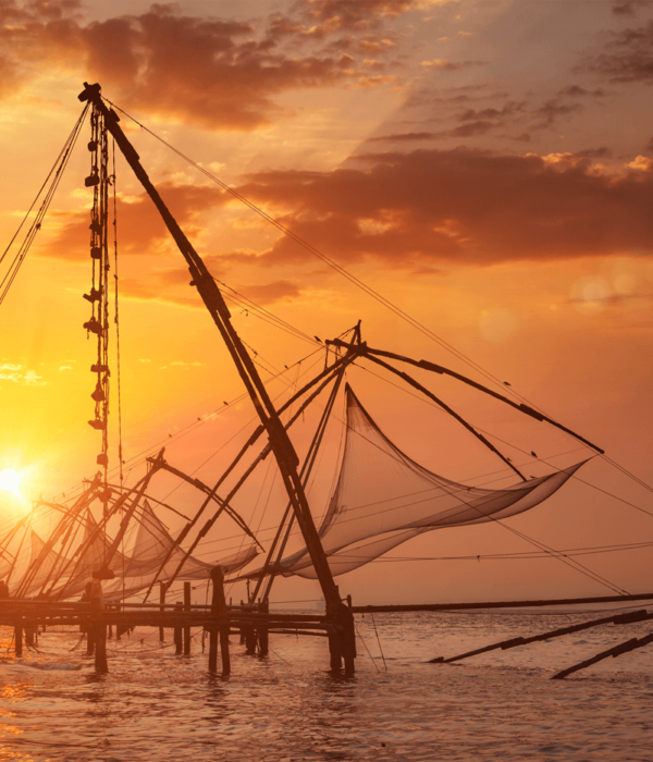 Traditional Chinese fishing nets at sunset in Kochi, Kerala, India
